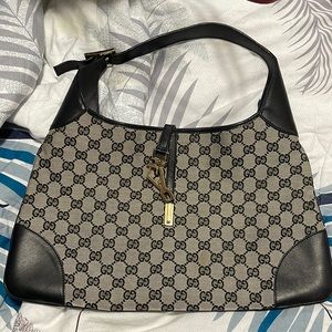 Authentic Gucci handbag, Jacky collection, light spot on the front.